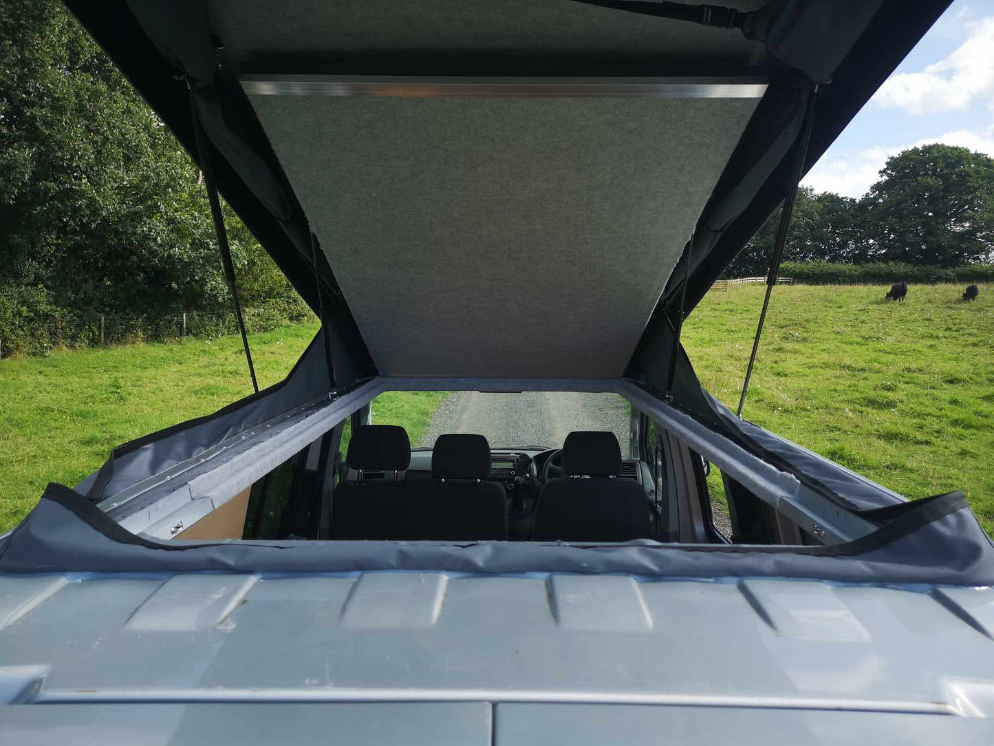 Raising Roof Bed - sleeps up to 2 adults / 3 children